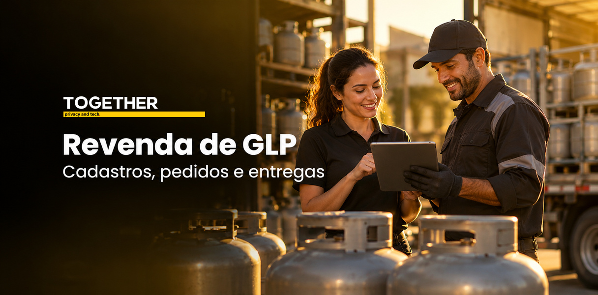 Atendente e entregador em uma revenda de GLP com botijões organizados.